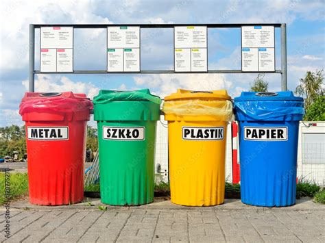 Color coded trash bins for waste segregation described in languages ...