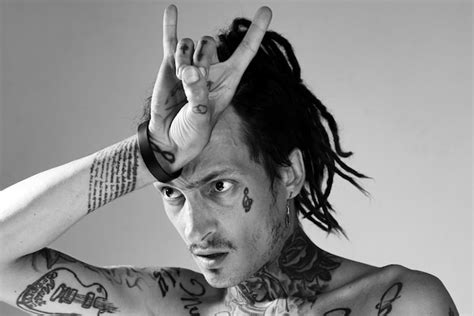 Premium Photo | Horn sign handsome tattooed man men tattoo fashion brutal guy