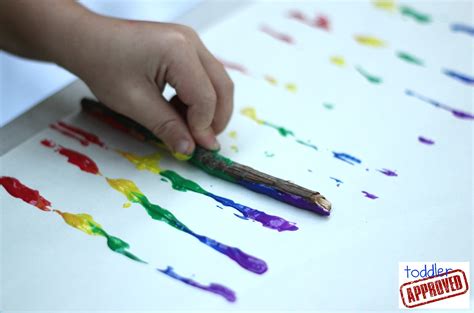 Toddler Approved!: Rainbow Stick Painting #readforgood