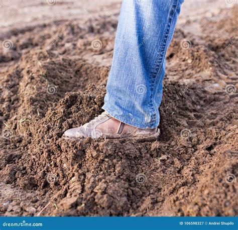 Feet in the mud stock image. Image of autumn, gear, weather - 106598327