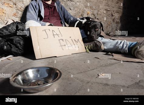 Beggar and his dog hi-res stock photography and images - Alamy