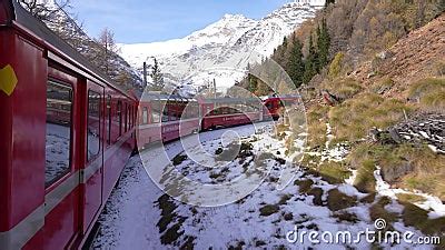 Bernina Pass, Switzerland. the Famous Red Train is Riding To the ...