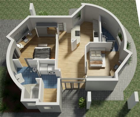 an aerial view of a house with its living room and kitchen