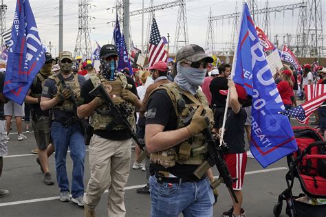 Gun carrying protesters continue to gather outside US vote counting centres | Isle of Wight ...