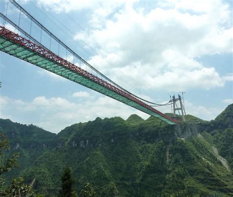 Sidu River Bridge, China – Height of 496 m (1,627 ft). This 1,222 m (4,009 ft) long suspension ...