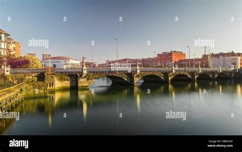 Belfast, Northern Ireland- Queens Bridge and the Belfast skyline Stock ...