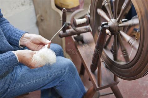 Man Spinning Wool on a Traditional Spinning Wheel. Stock Photo - Image of handmade, indoors ...
