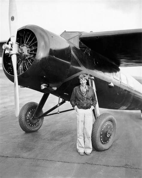 Amelia Earhart And Her Plane Photograph by Underwood Archives - Fine ...