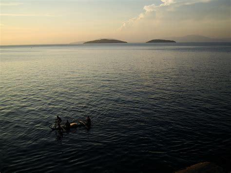 Asisbiz Leaving Calapan Port for Batangas Calapan Bay area sunset ...