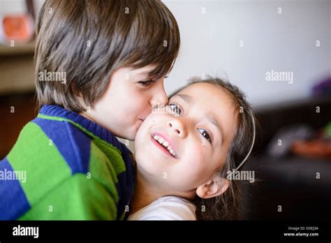 children kiss on the cheek Stock Photo - Alamy