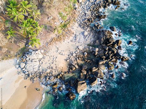 "Aerial View To Pristine Beach With Rocky Bay And Waves Crashing" by ...