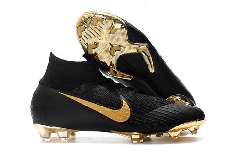 a pair of black and gold nike soccer cleats with the word, golden horse on