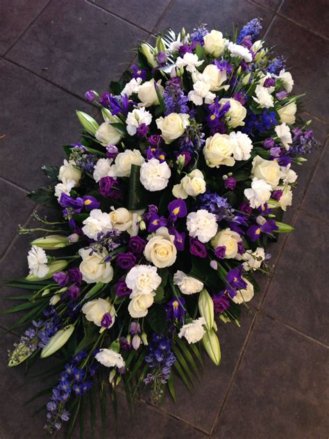 Blue and white casket spray | Funeral flower arrangements, Funeral ...