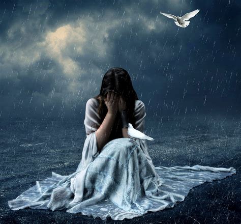 Lonely girl crying with tears in rain thinking of forgotten love and ...