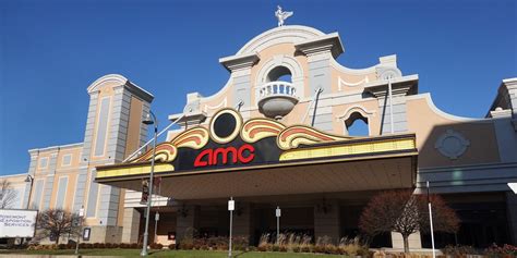 AMC Nets $917 Million in Financing to Ward Off Bankruptcy - WSJ