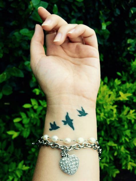 Three Little Birds Wrist Tattoo