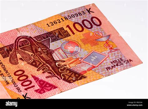 1000 CFA franc bank note. CFA franc is used in 14 African countries Stock Photo - Alamy