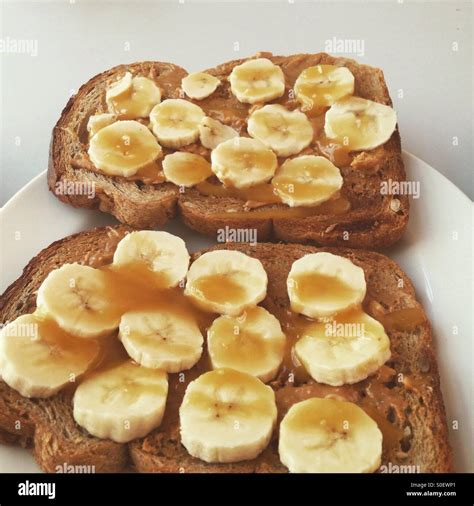 Banana peanut butter toast Stock Photo - Alamy