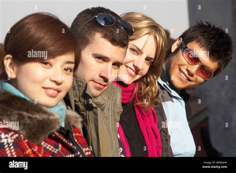 Young People Smiling At Camera Stock Photo - Alamy