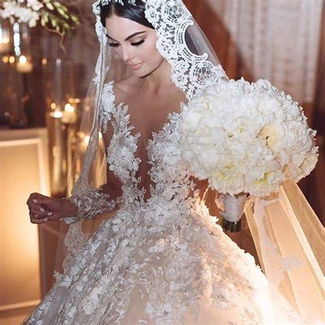 We don’t know what we love more, Ximena Navarrete glamorous BENITO SANTOS NOVIAS gown or her ...