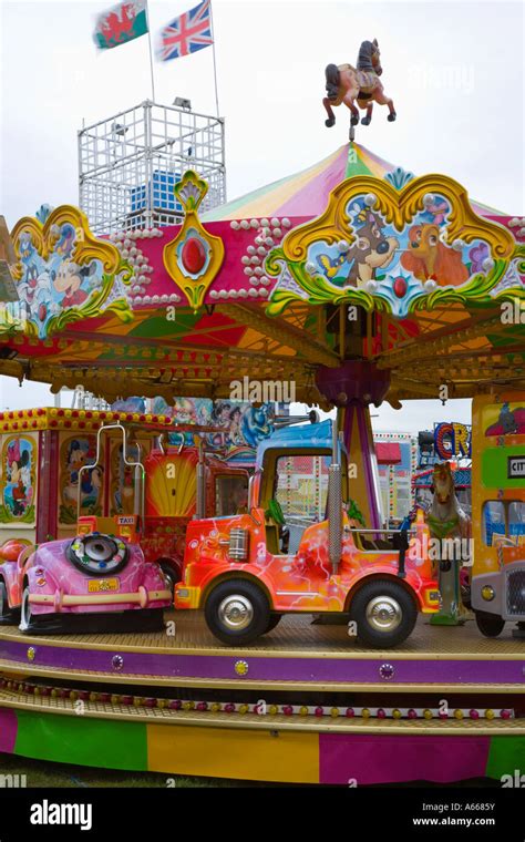 Collins travelling fair Ghost Train and childrens amusement rides for Stock Photo: 11474246 - Alamy