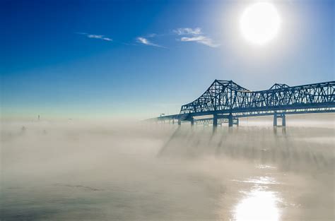 Greater New Orleans Bridge At Sunrise Mist On The River Stock Photo ...