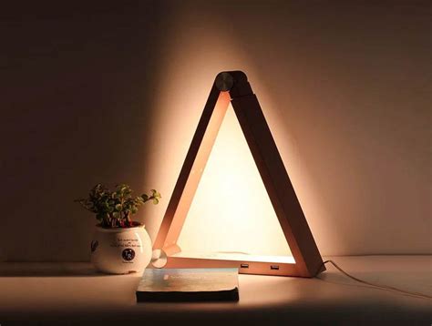 This Aluminum Triangle Desk Lamp Works as an Accent or Task Light in One