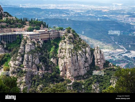 Benedictine abbey Santa Maria de Montserrat on Montserrat mountain in ...