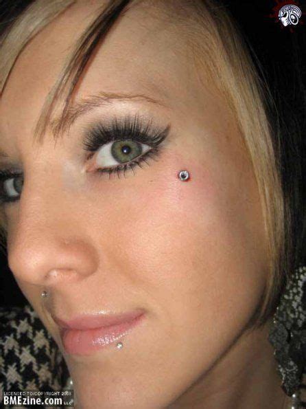 Pin by Katie Strand on Tattoos | Face dermal piercing, Face piercings, Dermal piercing