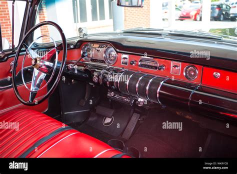 View of the interior of a two-toned 1955 Buick Special automobile on display at a classic car ...