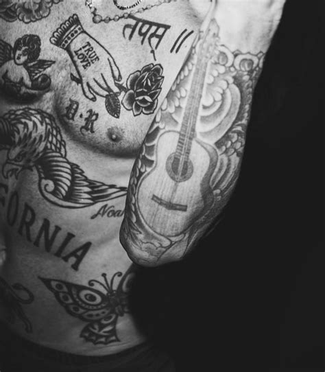 Adam Levine's most famous tattoos and their meanings