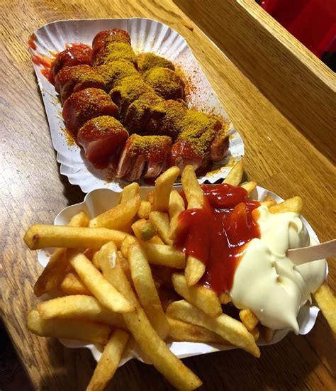 Spicy German curry wurst with sizzling crispy fries. #germanstreetfood ...