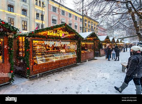 Oslo, Norway - Traditional Christmas market with falling snow Stock Photo - Alamy