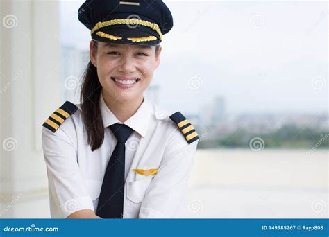 Portrait of a Pretty Female Pilot Smiling Stock Image - Image of ...