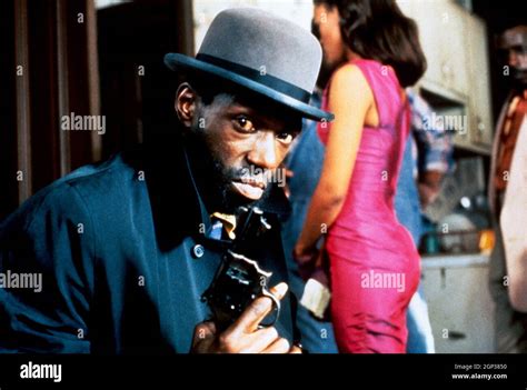 A RAGE IN HARLEM, from left: Badja Djola, Robin Givens, 1991. ph: © Miramax / courtesy Everett ...