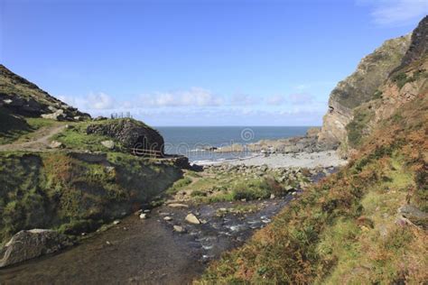 North Devon Cliffs and Beach Stock Photo - Image of beach, flowing ...