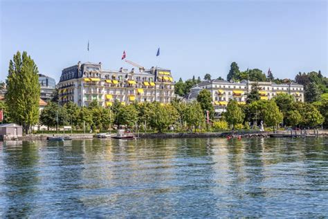 Lausanne, Switzerland, 07/30/2016: Old Hotel on the Shores of Lake Lemann in a Rich European ...