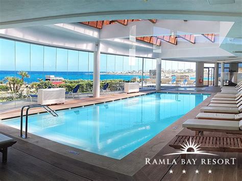 Full Day at the Ramla Bay Resort including Room, Buffet Breakfast, Lunch, Spa Access with Indoor ...