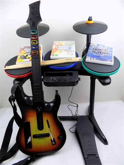 Wii Guitar Hero Rock Band Bundle Drum + Guitar + Kick + Sticks + 3x ...