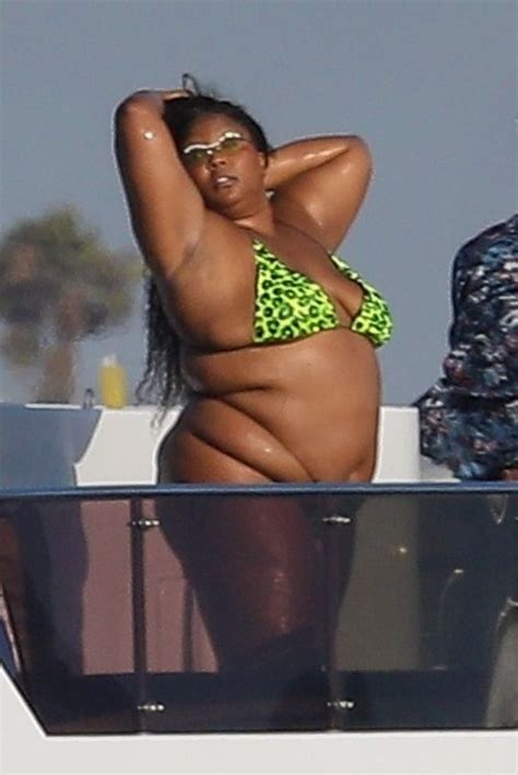 Lizzo works her angles in tiny leopard print bikini for photoshoot | Metro News