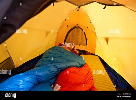 A man sleeping in tent, Jasper Provincial Park, Alberta, Canada Stock ...