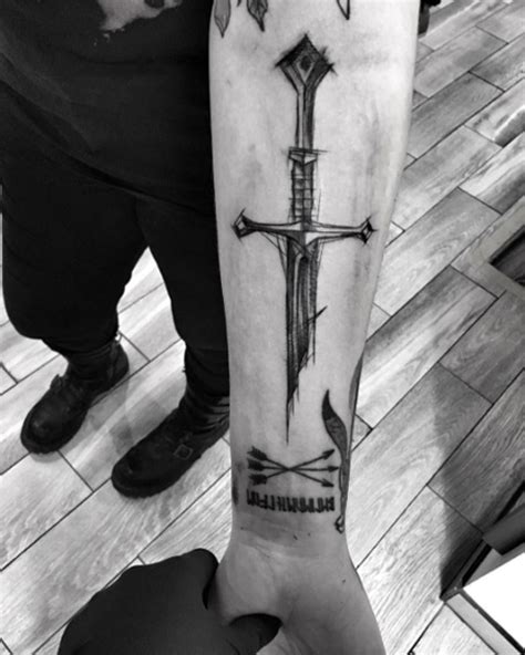 50 Amazing Sword, Dagger, and Knife Tattoo Designs - TattooBlend