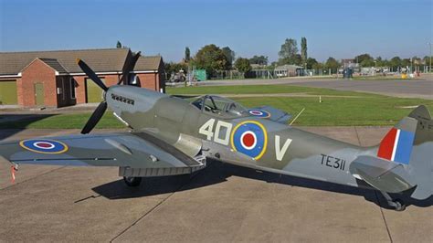 Battle of Britain Memorial Flight unveils new Spitfire - BBC News