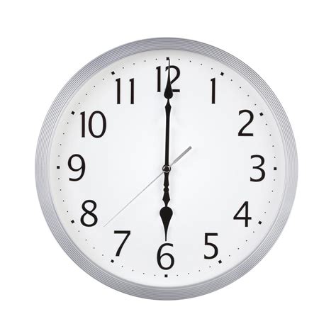 Six o'clock on a round clock 3586901 Stock Photo at Vecteezy