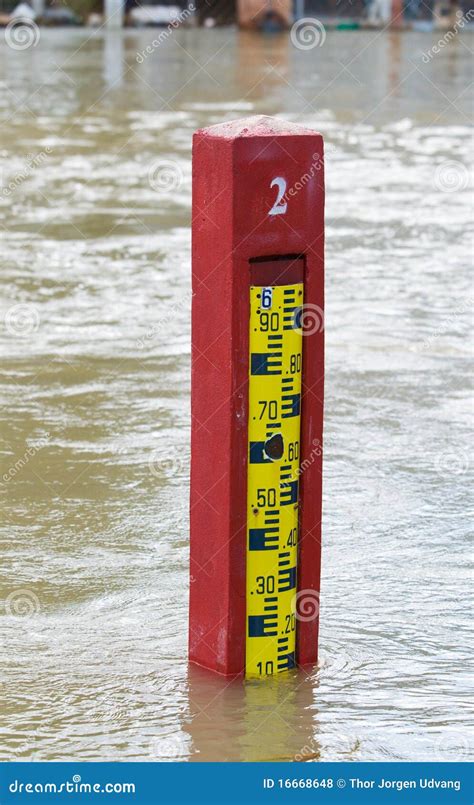 Water Level Indicator In A Flooded River Royalty Free Stock Photos - Image: 16668648