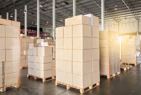 Packaging Boxes Stacked on Pallets in Storage Warehouse. Cardboard ...