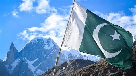 Pakistan Flag In White Covered Mountain Background Under White Clouds Blue Sky HD Pakistan Flag ...