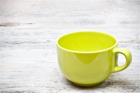 Premium Photo | Green coffee cup