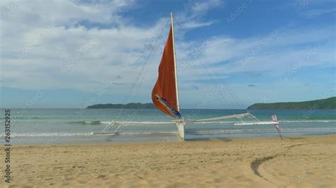 Traditional filipino bangka boats anchored on gorgeous tropical beach. Travel concept. Palawan ...