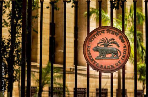 Delhi, India, 2020. RBI logo on the closed iron gate of Reserve Bank of ...